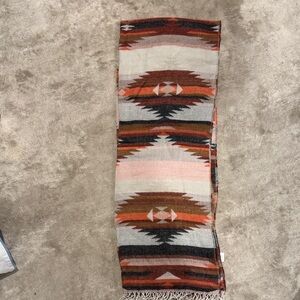 Una Tella Geometric Patterned Scarf in Red, orange, Black, and Cream-